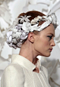 Vlada at Chanel Spring 2009 Haute Couture. The Headdresses were made of paper.