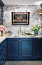 Opulent tones, marble materials and midnight blues - Heritage Bathrooms loves this gorgeous kitchen: 