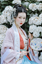 青鲤来时遥望春溪声声碎，嗅得手植棠梨初发轻黄蕊。