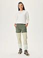 RecTrek Zip-Off Pant in the color Tea Tree/Calcite/Milk Stone - a person wearing a white shirt and green pants