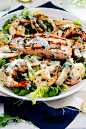Barbecued seafood salad with garlic greek yogurt dressing