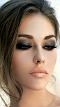 Smokey eyes and peach lips