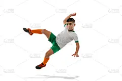 男孩的全身肖像，孩子，足球运动员在统一的训练隔离在白色的背景。