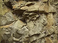 山纹理特写镜头。岩石纹理。枯燥乏味的石头背景。