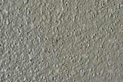 浅灰色到棕色调的干墙漆。