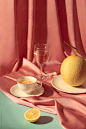 Melon wine and orange tea on pink background. by Marc Tran  - Stocksy United