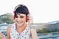 Young woman wearing headphones : Stock Photo