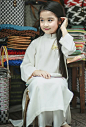 chon-ao-dai-xinh-cho-be-don-tet-6 Duyên dáng