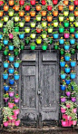 Moscow, Russia!!! Bebe'!!! Beautiful colorful jars surround the rustic doors!!!