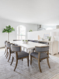 Kitchen/dining room combo - large contemporary beige floor kitchen/dining room combo idea in Los Angeles with white walls