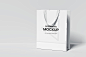 Shopping Bag Mockup on White Background - GraphicXtreme : This realistic shopping bag mockup is really perfect to showcase your amazing design. Add this to your portfolio and see the difference.