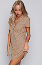 Call me Lacie Dress Beige : Stay on trend and lace it up with the Call me Lacie Dress Beige. In a shade of beige, this mini dress features short sleeves and a plunging V neckline with metal eyelet and adjustable lace-up details. Amp up the glam factor and