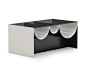 Waves by Minotti —  | ECC : With a direct reference to the undulating profile of the ocean, the Waves coffee table consists of a Smoked Grey-coloured glass top, which is supported by a painted aluminium structure - in a Sand or Light Bronze tone on the ou