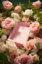 a pink box surrounded by white roses, in the style of nature-inspired imagery, smooth surfaces, sun-kissed palettes, realistic trompe-l'oeil, uhd image, spatial, flat form