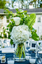 Floral Arrangement ~ white hydrangeas and roses and green ferns, host leaves: