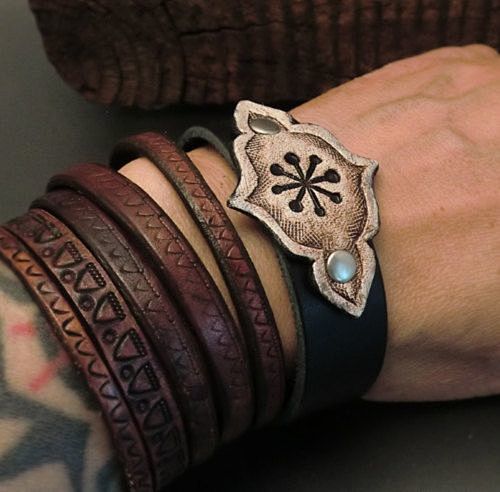 tooled leather cuffs...