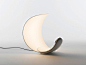 Curl - Sebastian Bergne Curl was designed with the intension of joining the light source and reflector with one simple gesture. The result is an object with a natural sculptural presence, it has no apparent base so can stand in different orientations and