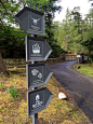 Signage designed by SHINE for The Torridon/ This lets guests know which way to go in the resort and find their way around.