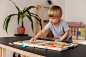 Medium shot child playing with toys
