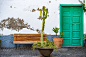 Aged and ancient entrance door with bench and potted plants by Hex Baxx on 500px