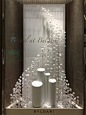 3d hears suspended in a wave patter for jewelry Window Display and Visual Merchandising