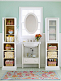 These shelves give this bathroom plenty of useful storage space! More bathroom storage: http://www.bhg.com/bathroom/storage/storage-solutions/store-more-in-your-bathroom/?socsrc=bhgpin092513mirroredstorage&page=1
