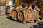 Vintage Oak Barrels For Wine Barrels On Coasters Old Stone Courtyard Stock  Photo - Download Image Now - iStock