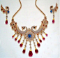 Indian Jewellery and Clothing: Peacock design pendants and earrings..: 