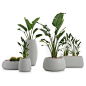 Gobi Planter 1 : The serene look of the Gobi collection of planters is inspired by the gently rolling landscape of desert dunes. These round pots with their elegant curves are specially designed for use in outdoor spaces as they are made from 100% recycla