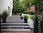 Large trendy backyard deck photo in Atlanta with a fire pit and a pergola