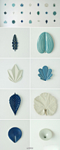 小小的叶子，一盏一盏在墙上朝夕相处 …… 来自丹麦陶瓷设计师Marian Nenielsen的小玩意儿：http://t.cn/adOKBP