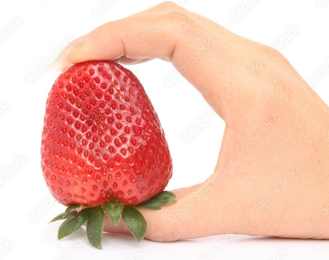 Strawberry with hand...