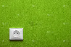 绿色墙上的插座
