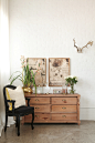 The black ball-and-claw chair and the chest of drawers are both from @homelivingspace. 