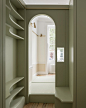 Upper Wimpole Street apartment by Jonathan Tuckey Design includes built-in storage walls