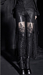 Black gothic lace stockings / hosiery with tall black laceup boots: 