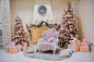 pillows beside sofa chairs in front of Christmas tree