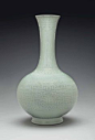 A RARE AND EXCEPTIONAL CELADON-GLAZED RELIEF-DECORATED BOTTLE VASE | QIANLONG SIX-CHARACTER SEAL MARK IN UNDERGLAZE BLUE AND OF THE PERIOD (1736-1795) | All other categories of objects, vases | Christie's