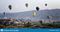 Hot air balloon flying over rock landscape at Cappadocia Turkey