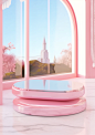 a table with a pink tray, on top of it's pink rim, in the style of dreamy, romanticized cityscapes, tomàs barceló, windows vista, curved mirrors, kawaii charm, iconic imagery, luxurious wall hangings
