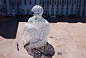 Giant Sculpture of a Man Made of Letters : Spanish artist Jaume Piensa's sculptural installation titled Nomade, translated as Nomad, is a literal man of steel. The figurative sculpture displays a gigantic replica of a man sitting with his knees to his che