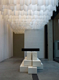 Partial curtains or ones that are moveable and fold up to be partial?  Art Gallery Showroom by Antonio Ravalli Architetti