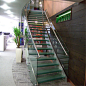 现代机械化弧形旋转楼梯不锈钢实木定制生产