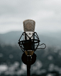 black and gray microphone with stand