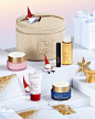 Photo by Clarins Official on November 21, 2023. May be an image of one or more people, lipstick, makeup, hair product, cosmetics, hand cream, perfume and text.