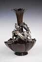 Japanese bronze vase with a silvered coiled dragon (tatsu)