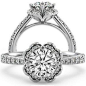 Looks like a clover!  Round Moissanite Floral-Style Engagement Ring