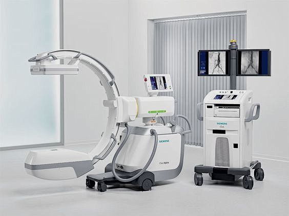 Mobile C–arm machine...