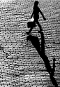 shadow | brick road | cobblestone | walking | vintage black and white photography | briefcase | shadows: 