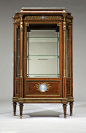 A French ormolu-mounted rosewood vitrine, Francois Linke ::  Last quarter 19th century, engraved script signature to right-hand drapery of left herm 'F. Linke' (Francois Linke 1855 - 1946 French), in Louis XVI style, the shaped bleu turquin marble top ove